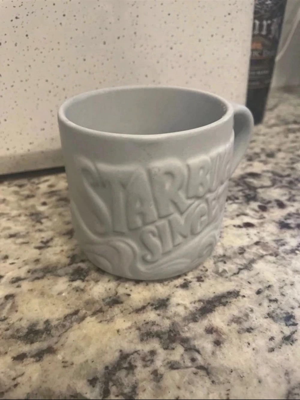 STARBUCKS® SINGLES Embossed Ceramic Mug -